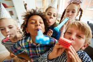 kids blowing party toys