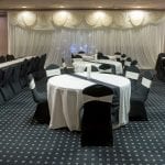 wedding venue with black table runners