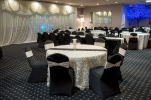 white flower tablecloth in wedding venue