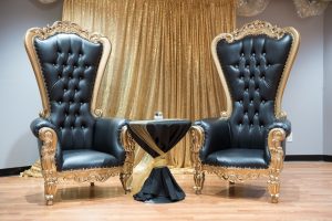 black and gold padded thrones